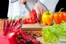 Chef Cutting a Bell Pepper