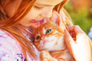 Little Girl with a Red Kitten