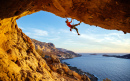 Climber on an Overhanging Rock